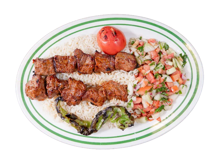 Lamb shish kebab cubes on skewer, flame-grilled