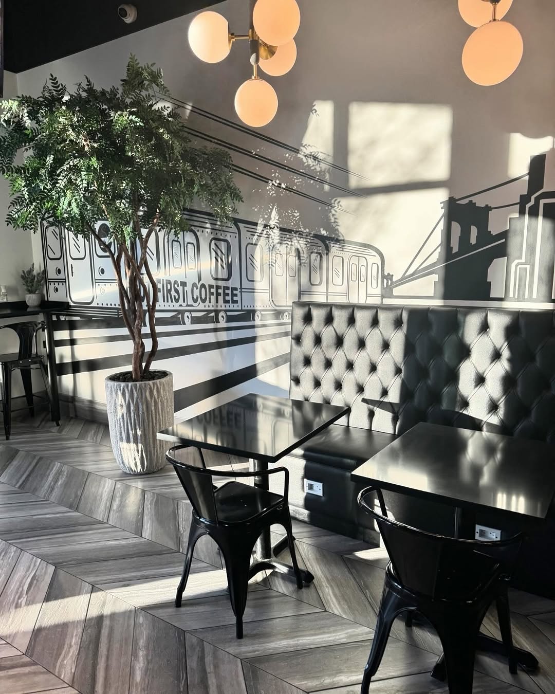 Steven’s Cafe interior — clean lines, natural morning light, calm Park Avenue space.